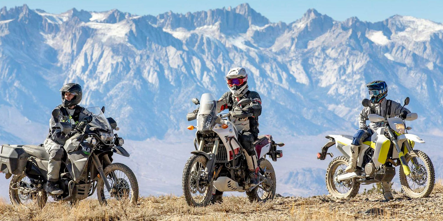 three adventure motorcycle riders