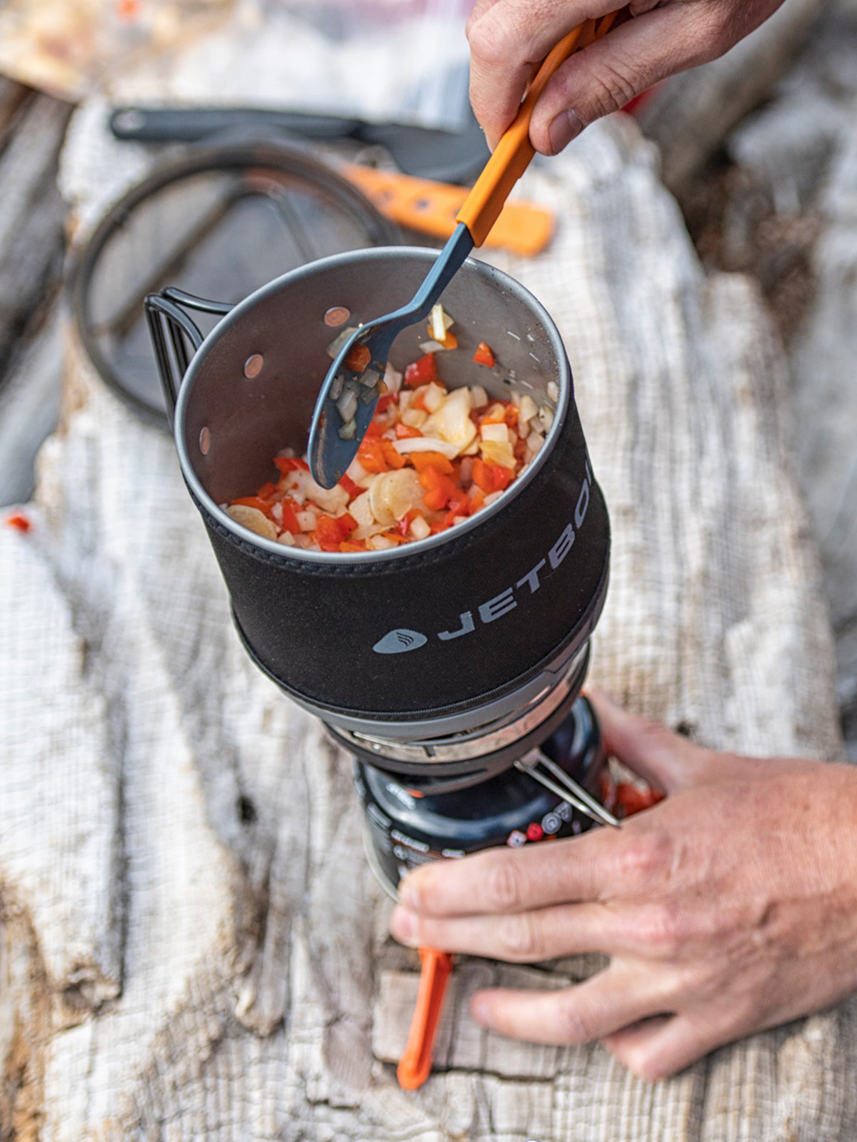 Jetboil MINIMO Cooking System being used to cook