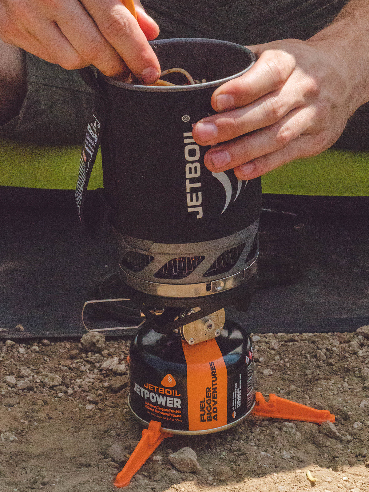 Jetboil MICROMO Cooking System being used to cook