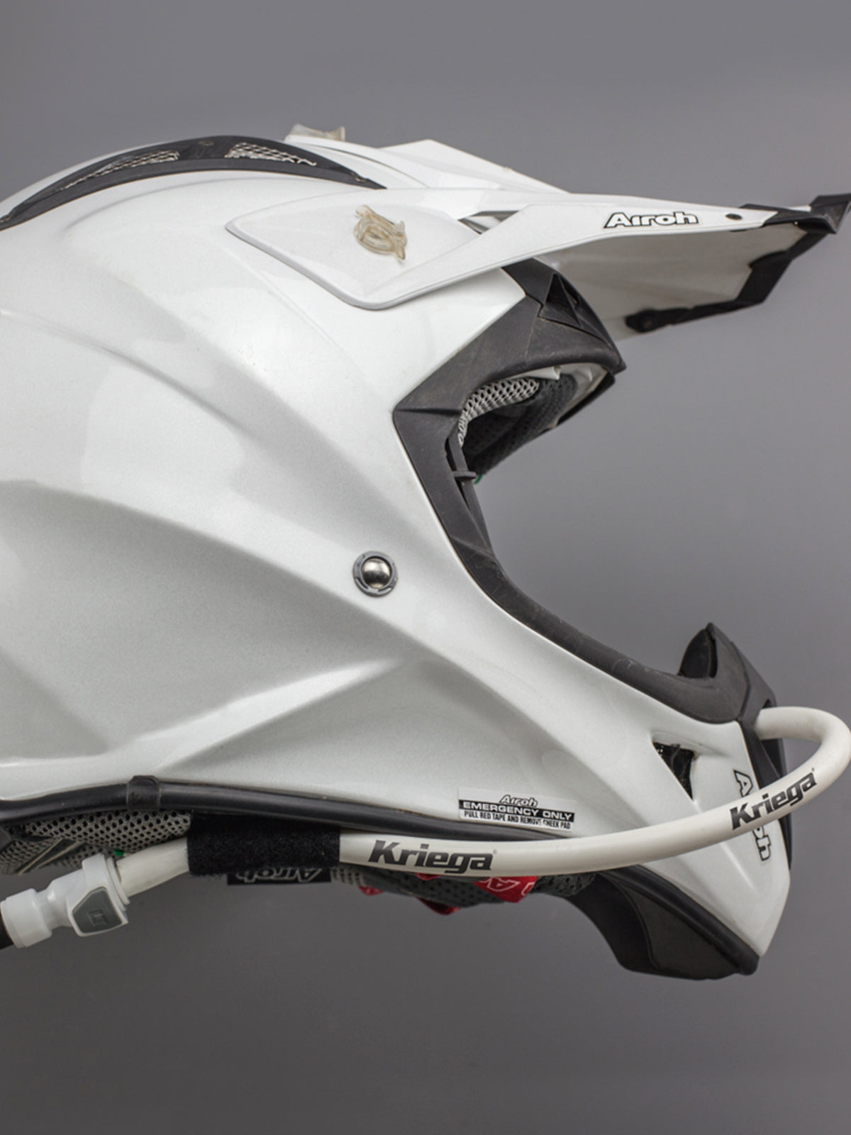 Kriega Hands-free Kit attached to side of helmet