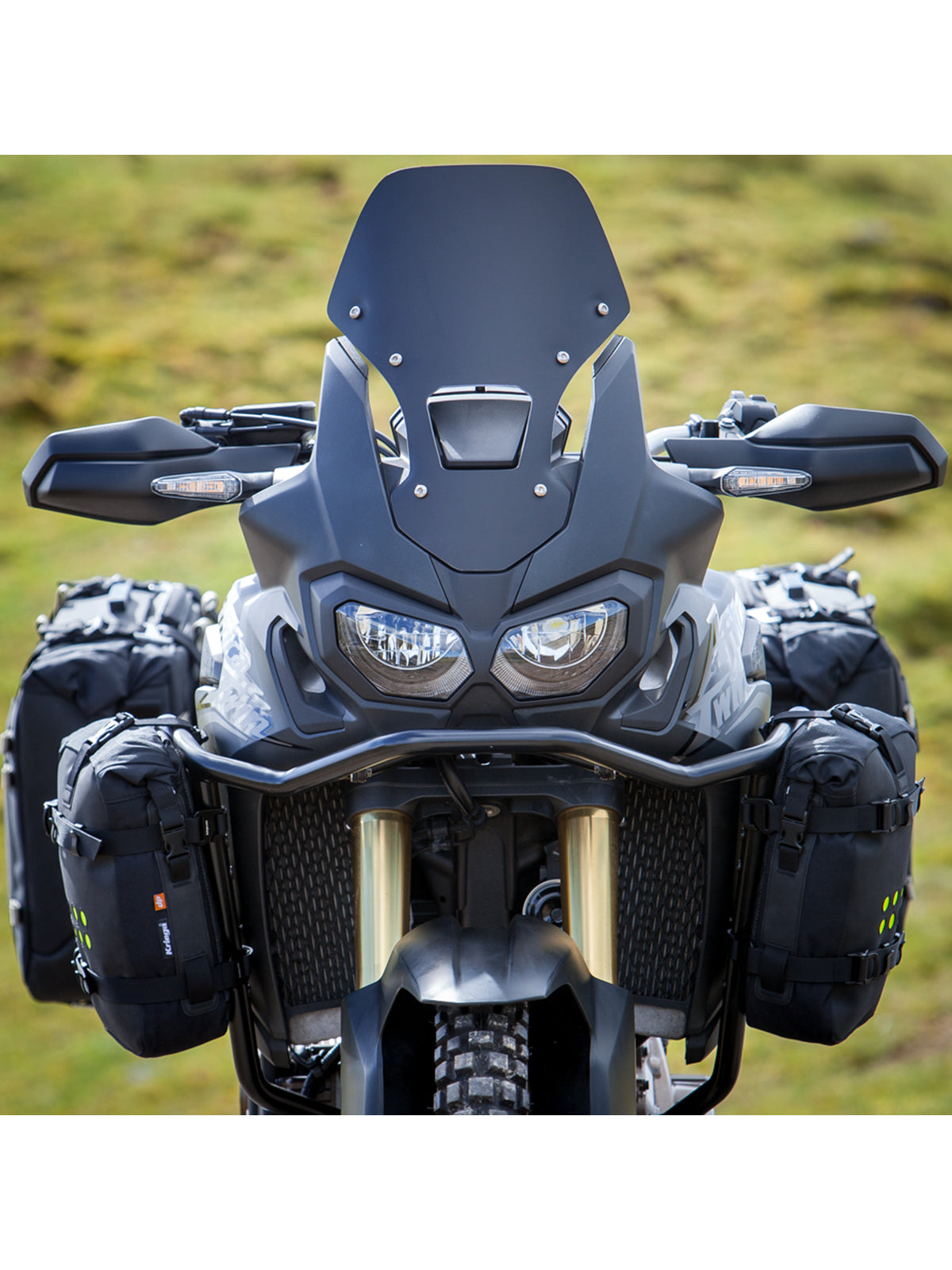 Two Kriega OS-6 Adventure Packs fitted to front of motorcycle