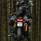 Kriega OS BASE Husqvarna Norden 901 in forest with rider looking left