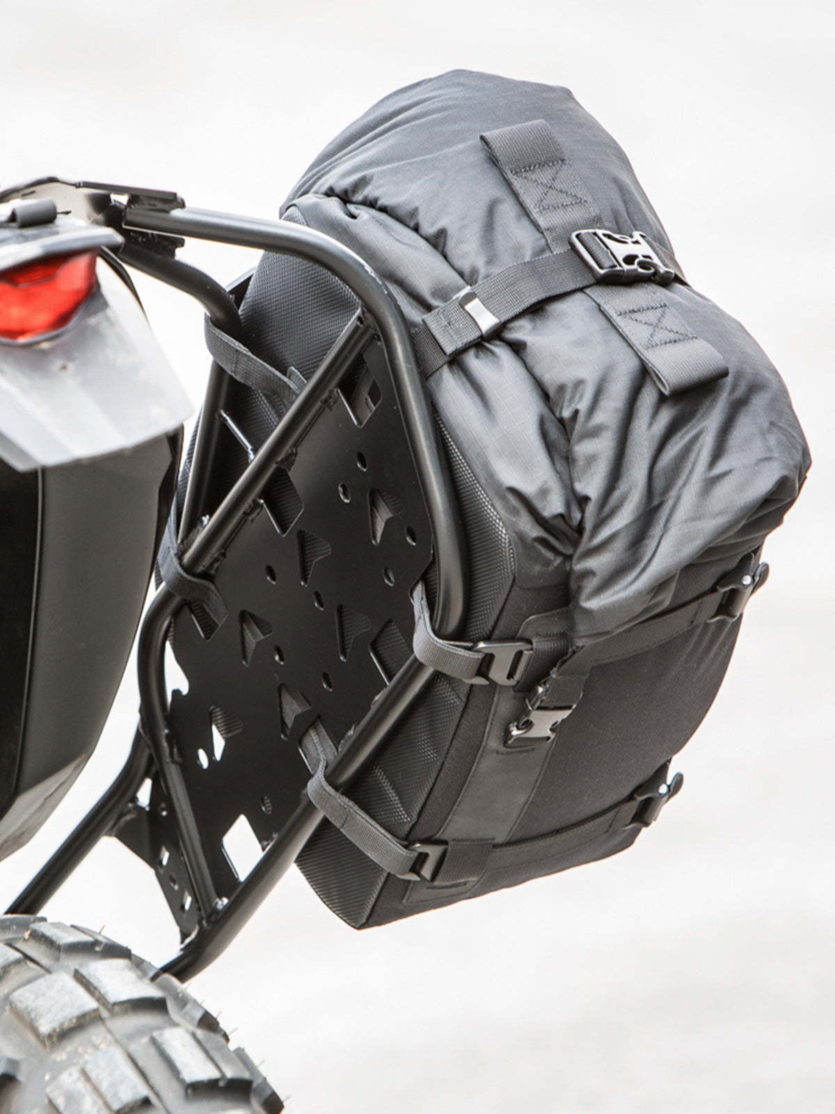 Kriega OS-18 Adventure Pack strapped to rear of bike