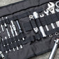 Kriega Tool Roll with tools on concrete floor