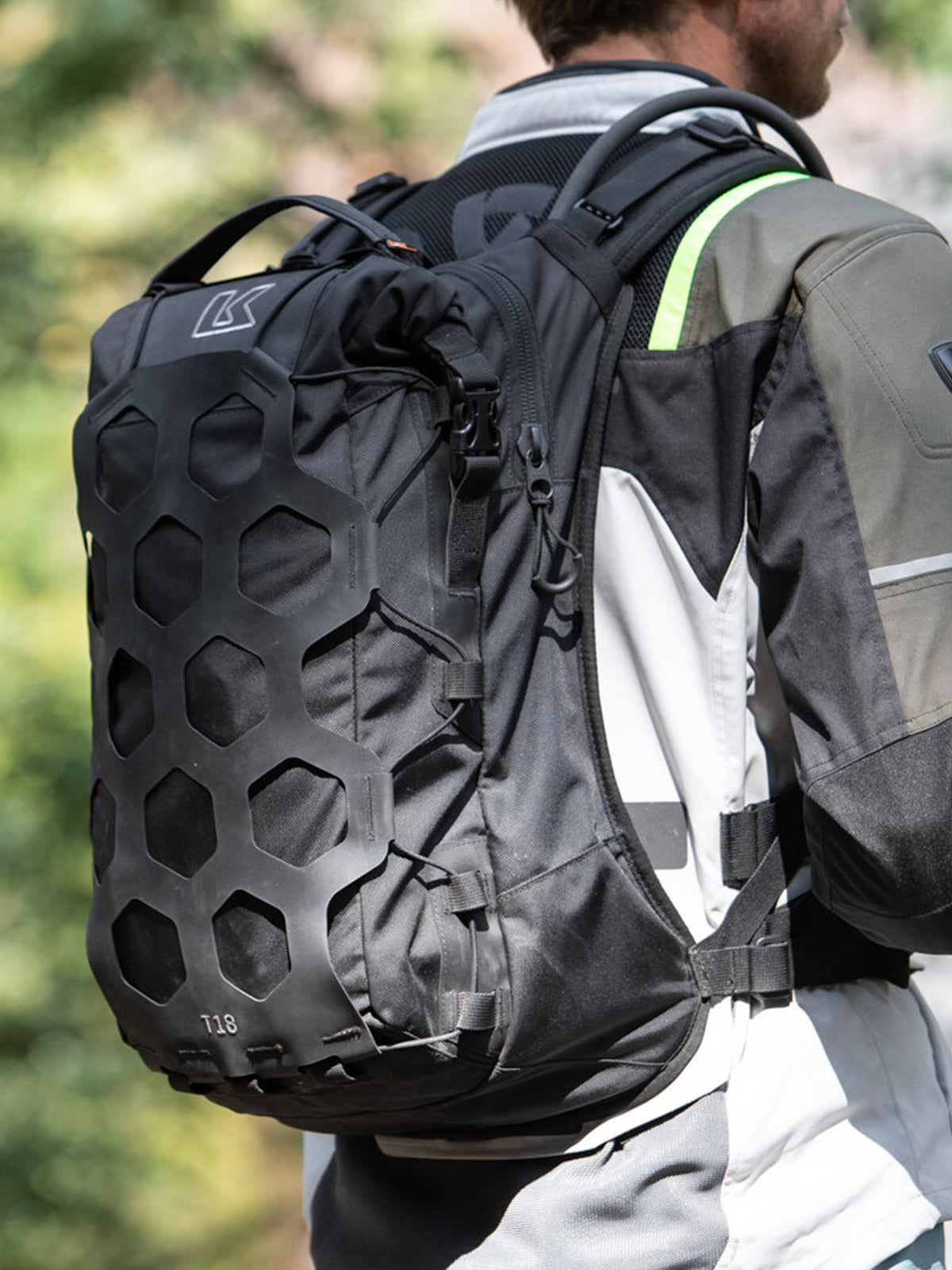 motorbike rider wearing Kriega Trail18 Adventure Backpack