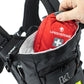 putting a medical kit in the Kriega Trail9 Adventure Backpack