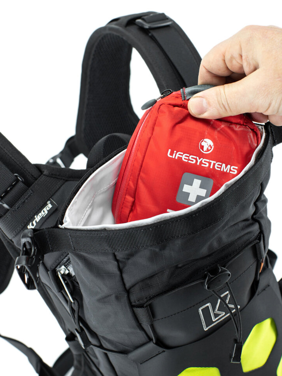 putting a medical kit in the Kriega Trail9 Adventure Backpack