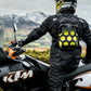 motorcycle rider on his ktm wearing a Kriega Trail9 Adventure Backpack looking at the mountains