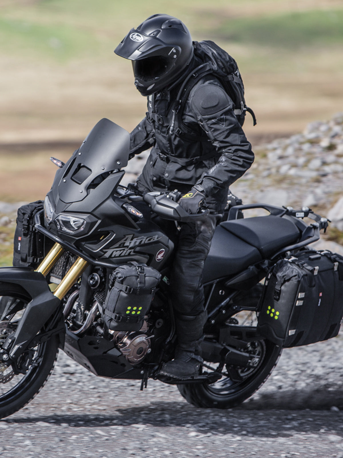 Kriega OS-32 Soft Pannier system in action with motorcycle rider